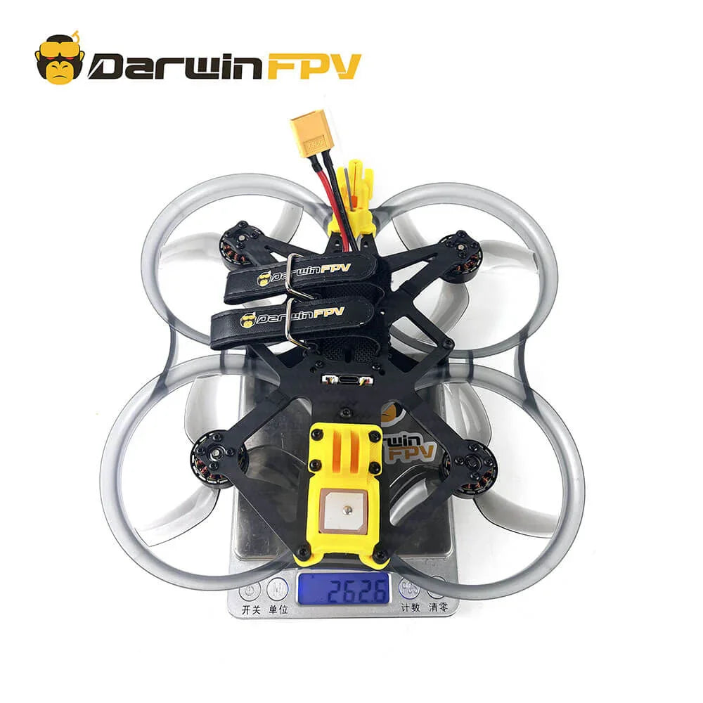 Top view of the DarwinFPV CineApe35 O3 without O3 drone showing its total weight of 262.6 grams on a scale