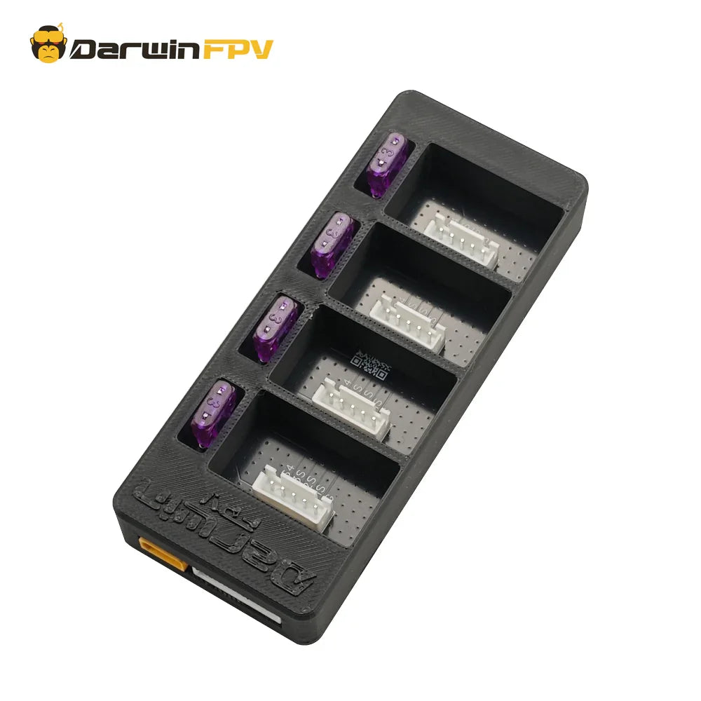 Angled perspective of DarwinFPV One Link 4S 4S battery parallel charging board, highlighting 4S battery slots and product markings for FPV drone charging.
