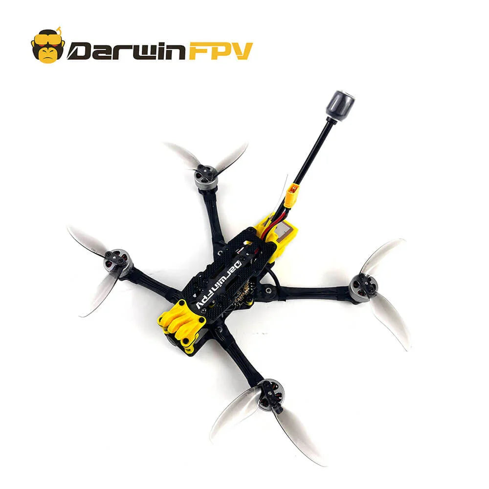 Top view of DarwinFPV Foldable FPV drone with extended propellers, featuring black and yellow design, visible antenna, and advanced camera setup for analog FPV display