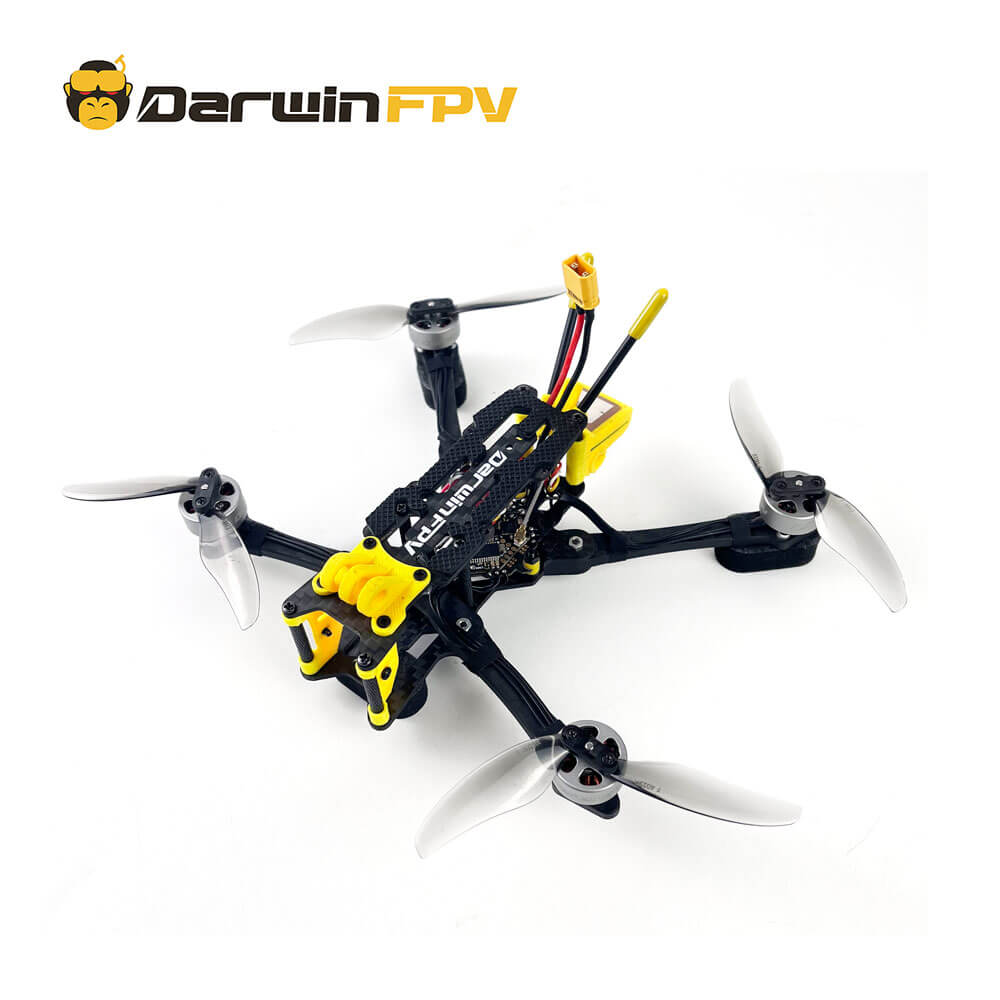 DarwinFPV FoldApe 4 drone featuring a lightweight carbon fiber frame, four propellers, and a yellow XT60 battery connector, designed for freestyle FPV flying and high-speed performance
