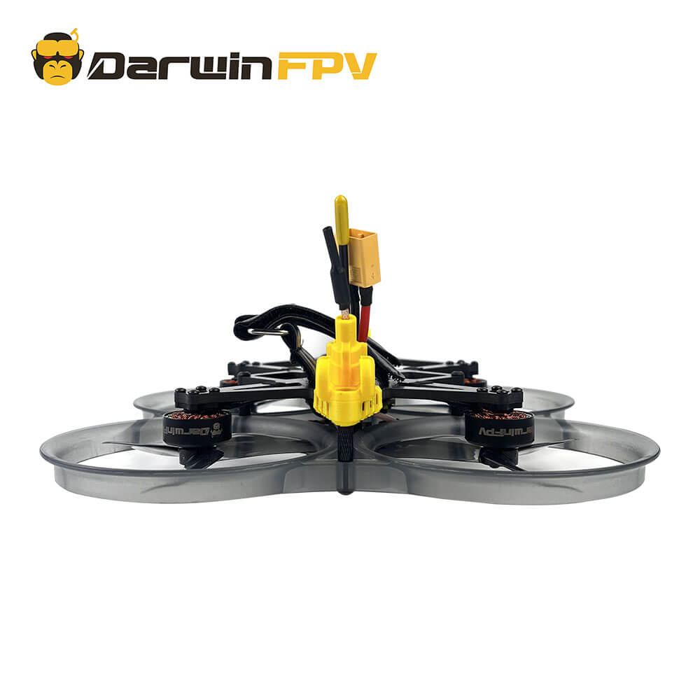 Rear view of DarwinFPV CineApe35 FPV drone showing the yellow antenna mount, wiring, and durable propeller guards for enhanced protection