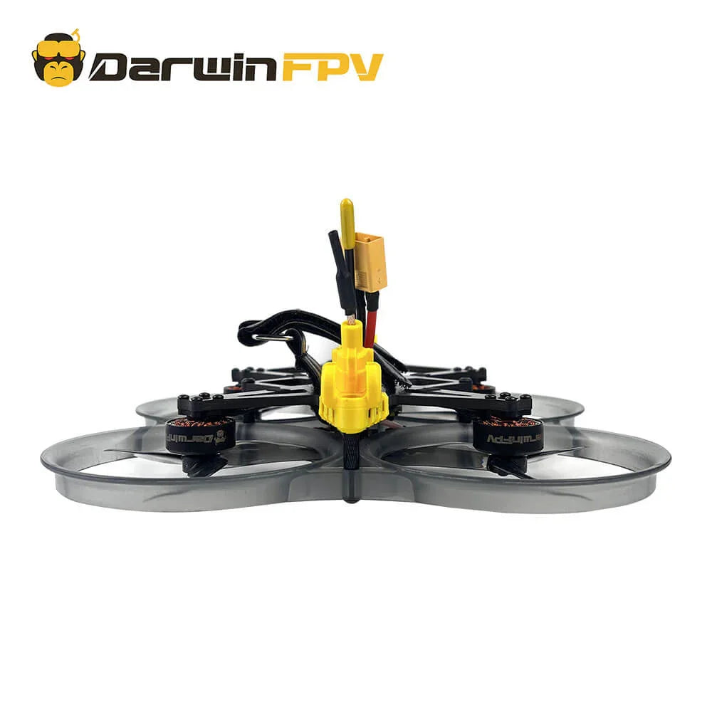 Rear view of DarwinFPV CineApe35 FPV drone showing the yellow antenna mount, wiring, and durable propeller guards for enhanced protection