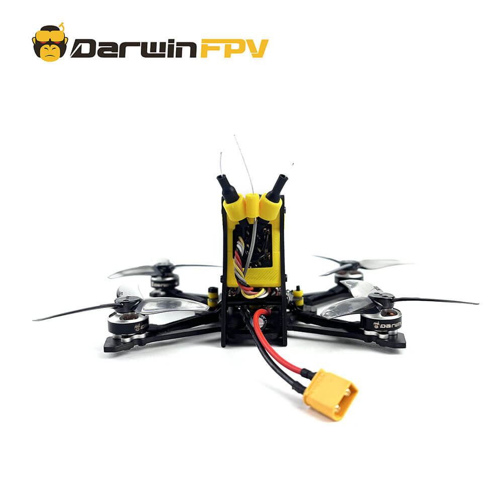 Rear view of DarwinFPV TinyApe O3 FPV racing drone, showing power cable and antenna setup