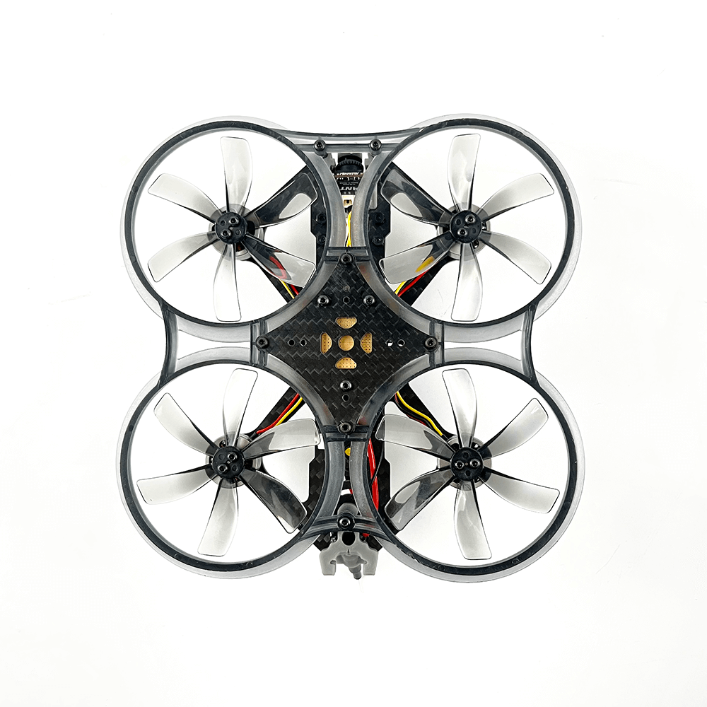 A bottom view of CineApe 25 quadcopter drone showing the layout of four propellers and a carbon fiber frame