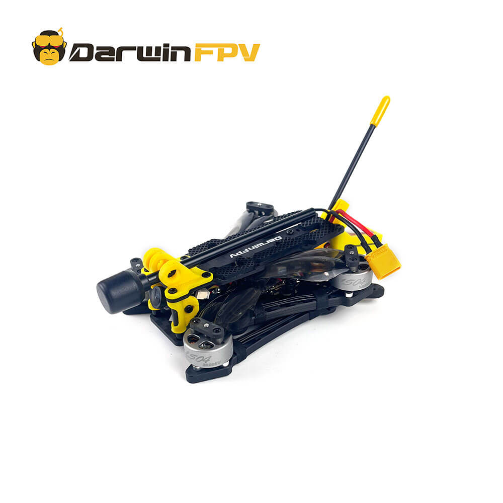 Top view of a DarwinFPV foldable FPV drone with yellow accents and a sleek design, featuring foldable arms and a mounted camera