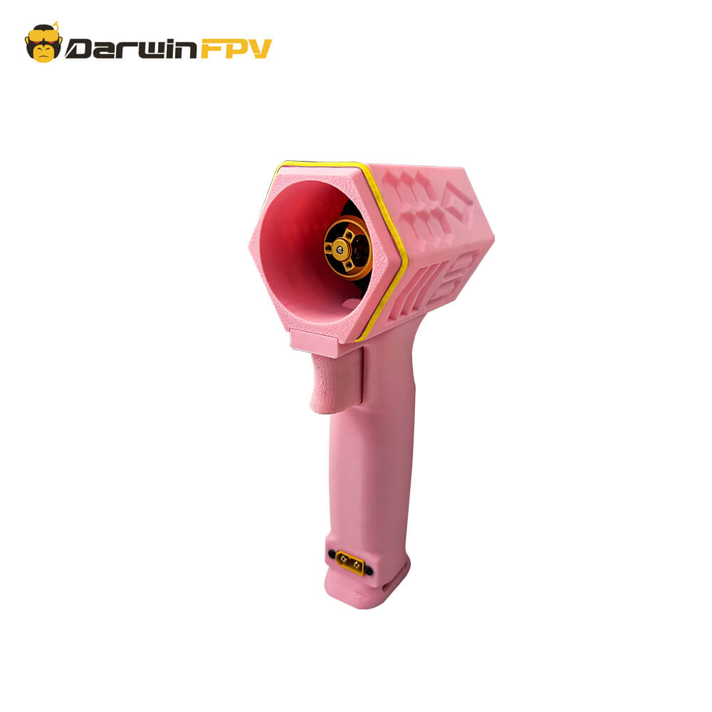  A DarwinFPV Violent Turbo Fan with a vibrant pink exterior, featuring a unique hexagonal design and a central fan unit with a gold and black color scheme.
