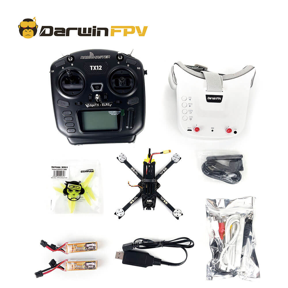 The picture shows the full -box opening equipment of Darwinfpv Babyape Pro V2, including remote control, FPV glasses, drones, batteries, propellers, and charging cables. This set contains all the basic equipment required for flight. It is a drone solution that is flying. It is very suitable for novice and drone enthusiasts.