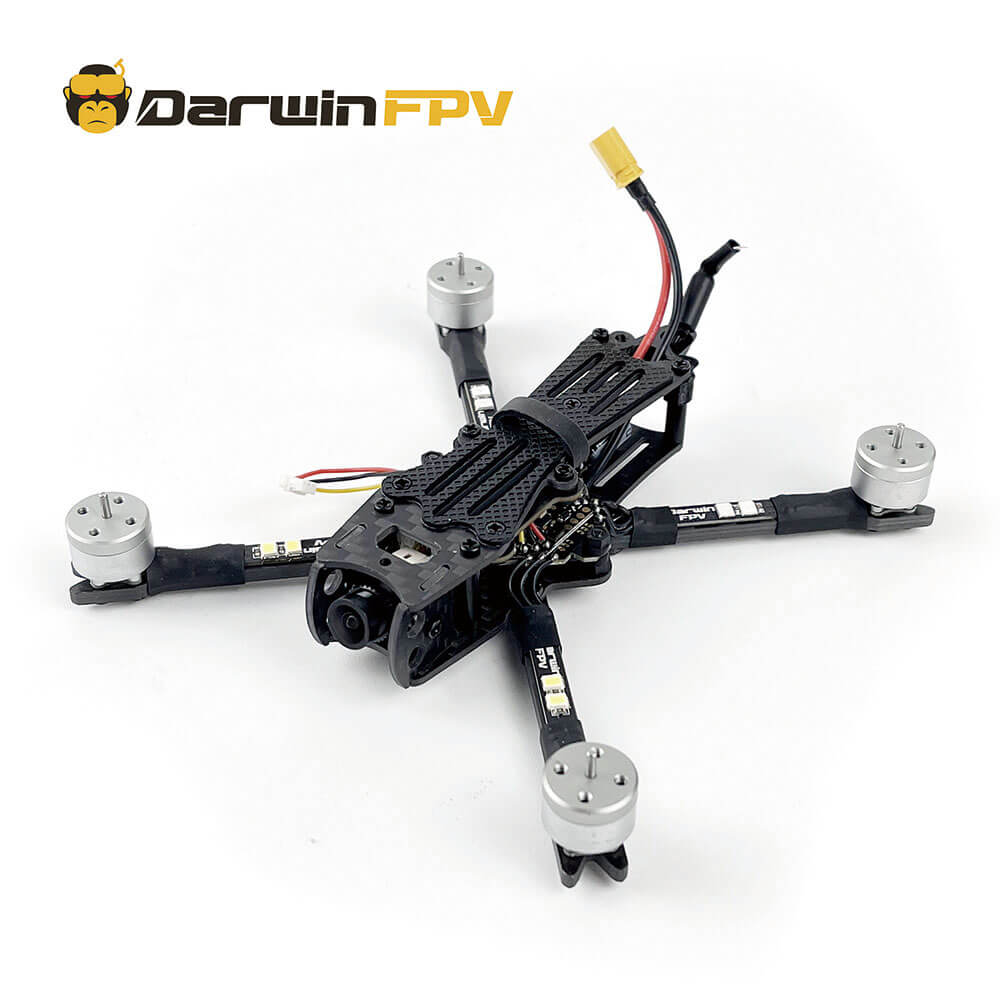 DarwinFPV FPV racing drone frame featuring four motors and a carbon fiber structure, ideal for high-speed quadcopter builds