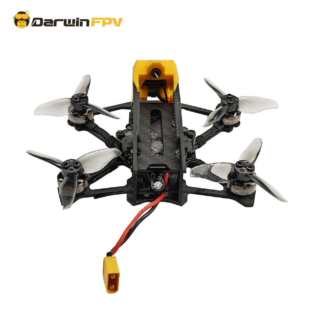 Top view of DarwinFPV FPV racing drone, displaying high-performance motors and robust frame construction optimized for fast, agile FPV flights.