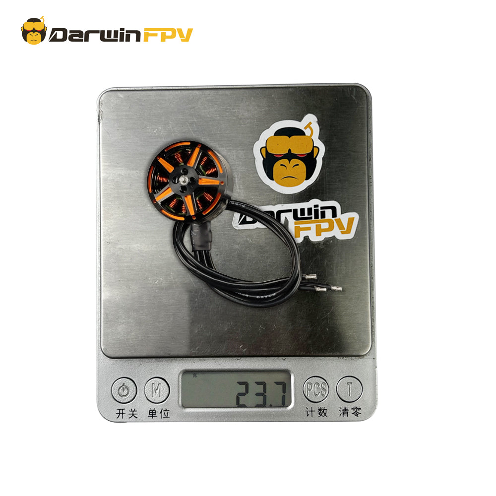 DarwinFPV SeaWater 2006.5 drone motor placed on a scale showing a weight of 23.7g.