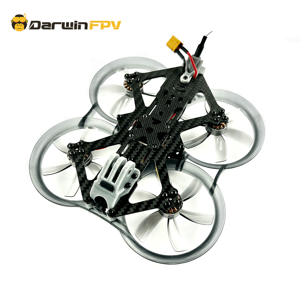 Full view of a DarwinFPV quadcopter drone featuring a protective frame and carbon fiber structure for indoor and outdoor flights