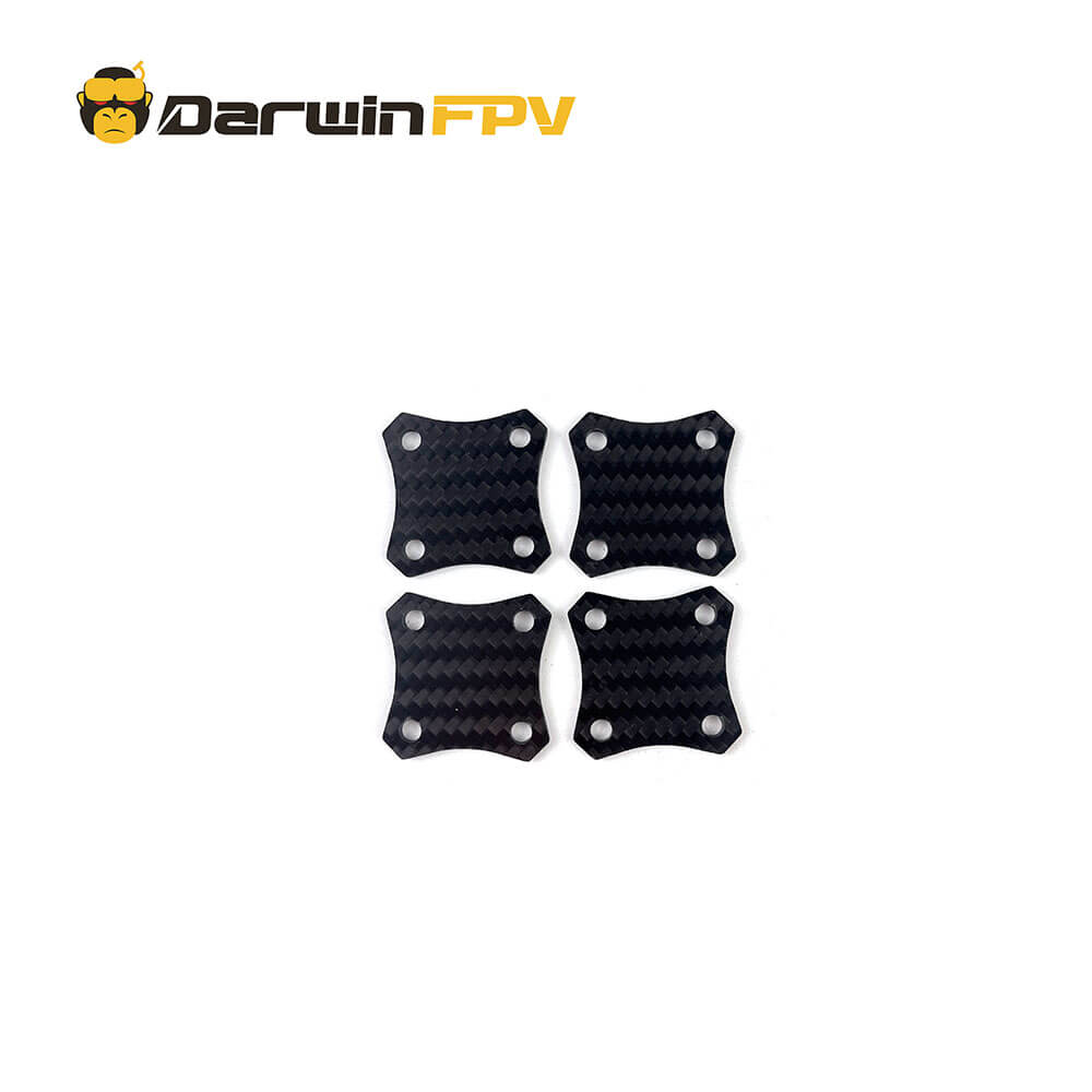 Set of four carbon fiber motor base plates for FPV drone assembly from DarwinFPV, featuring a lightweight and durable design for improved drone performance