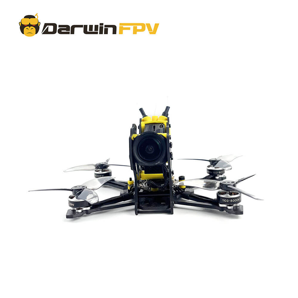 Front view of the DarwinFPV FoldApe4 O3 drone, focusing on the camera module mounted on the frame, along with four propellers and visible motors